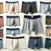 A display of men's boxer briefs in various styles and colors on a plain background, highlighting the variety available.