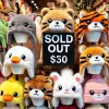 A-collection-of-cozy-fluffy-hats-inspired-by-animal-characters-like-cats-tigers-and-ducks-with-Sold-Out-signs-placed-on-the-display